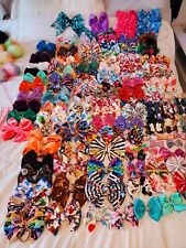 Massive lot of customer made bows, head bands, and pom poms and extra bow holder picture
