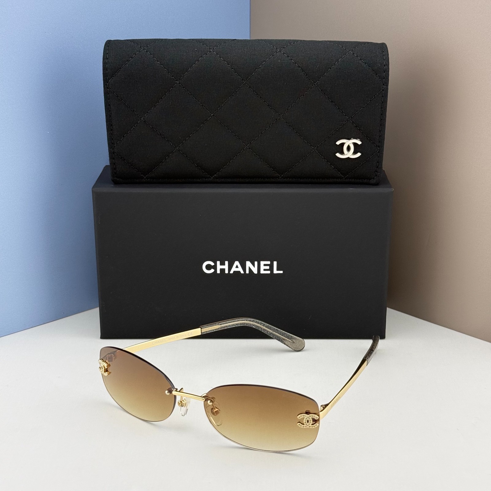CHANEL CHA71559 Rimless Sunglasses Gold Frame Brown Gradient Lens Women 57mm