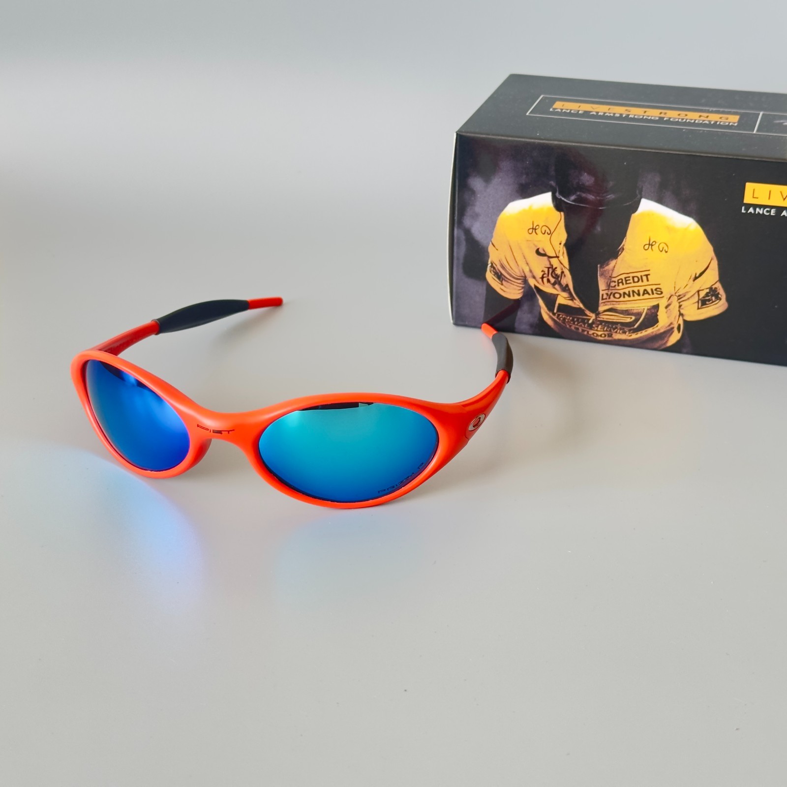 Oakley Eye Jacket Redux / PIET Sunglasses Orange Frame / Blue Lenses