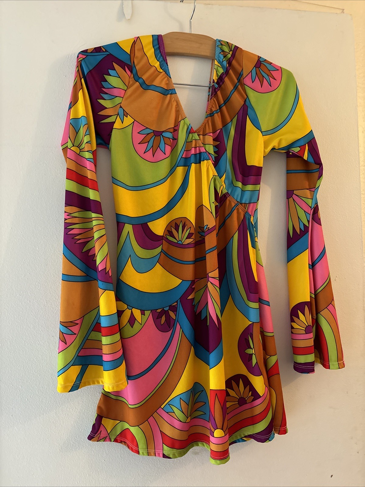 1970s-style psychedelic groovy Dress with a V-neck and flared bell sleeves