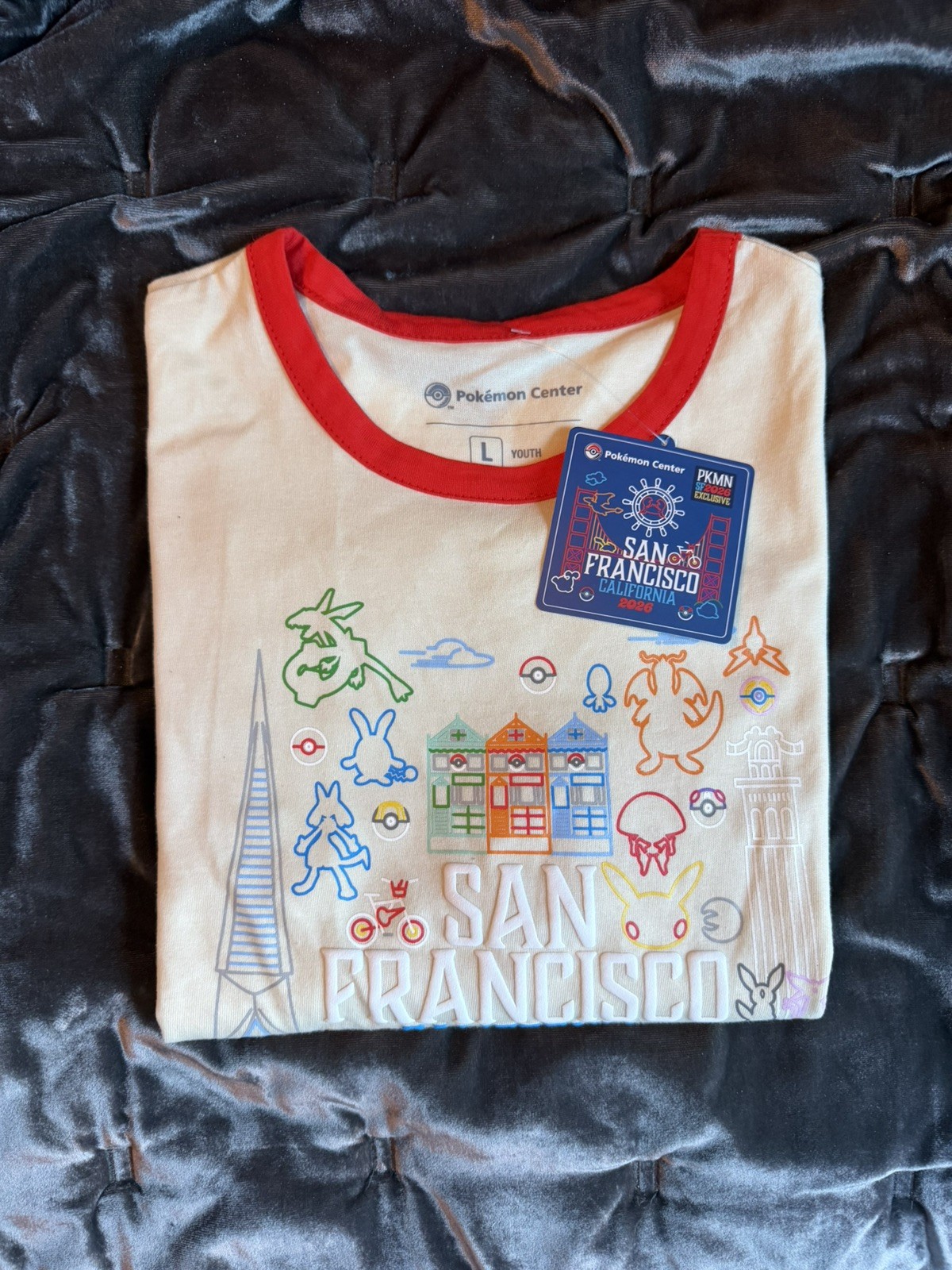 2026 Pokémon XP World San Francisco Exclusive Ringer White Cream Shirt