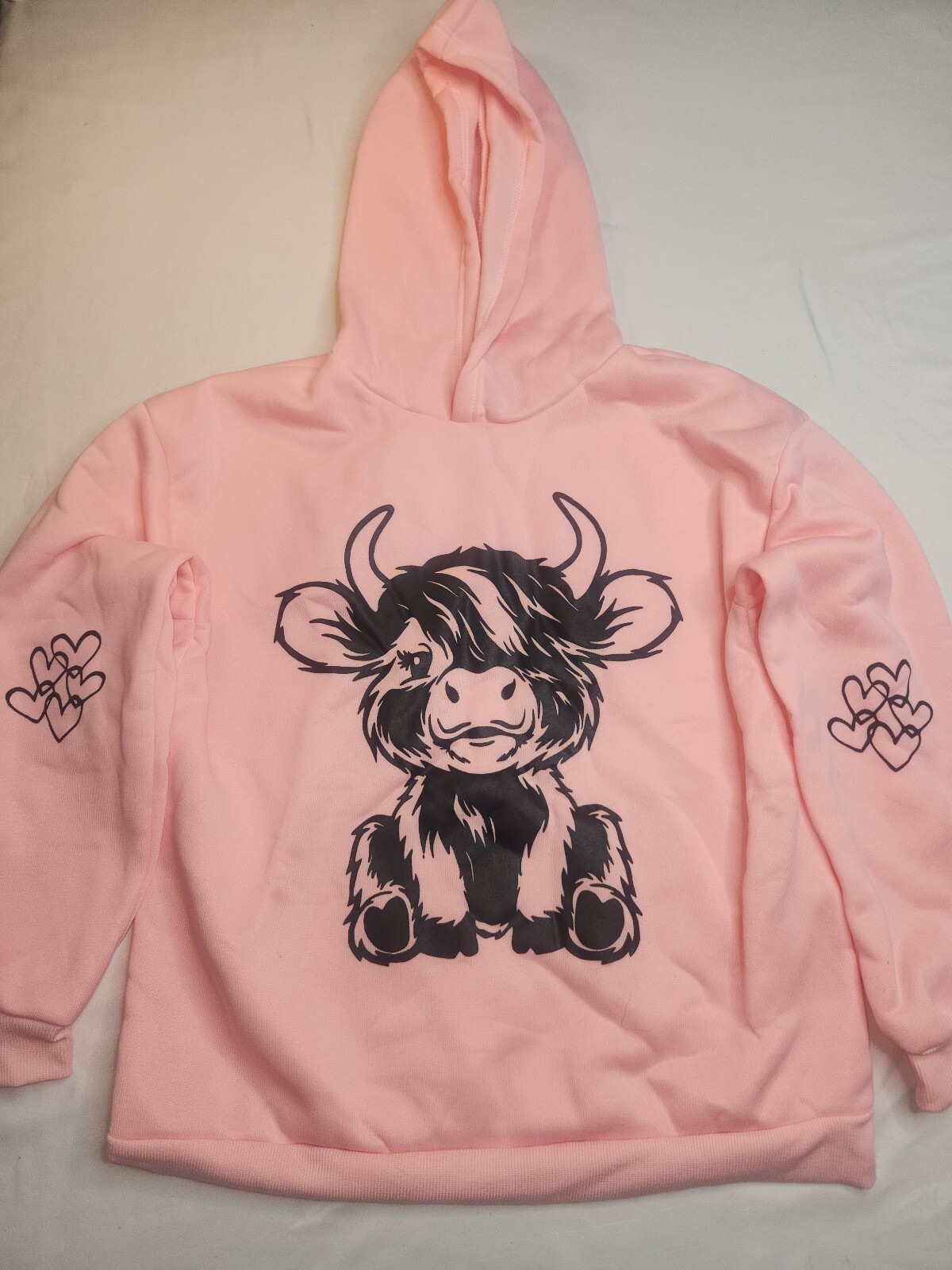 Pink highland cow graphic hoodie