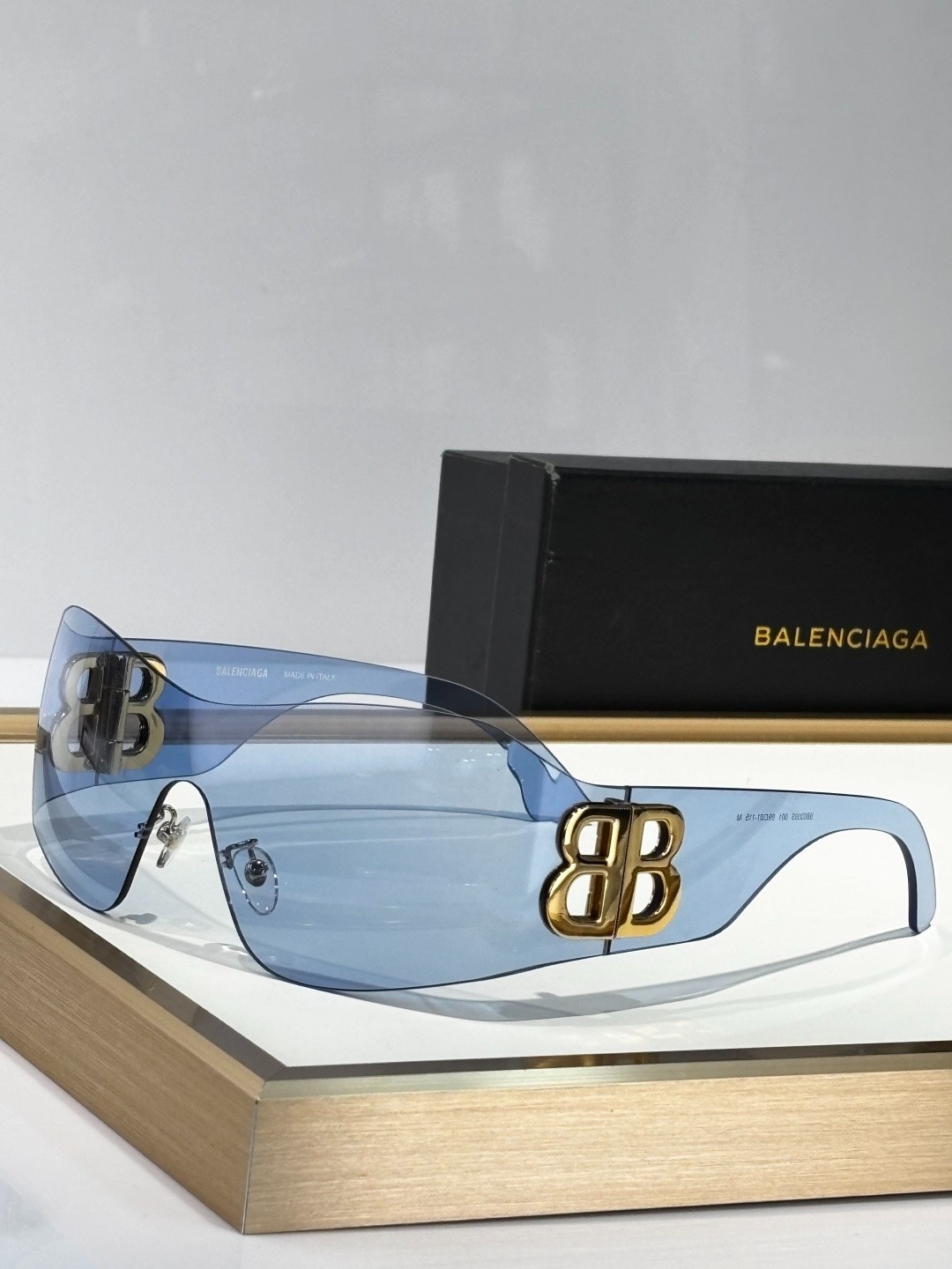 Balenciaga BB0359S Eyewear One‑Piece Shield Style Light Blue Tint 99‑01‑115