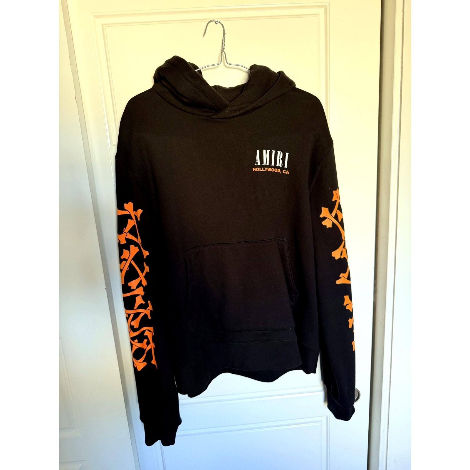AMIRI Hollywood CA Bones Popover Hoodie Mens L Black Orange PS22MJG024-063