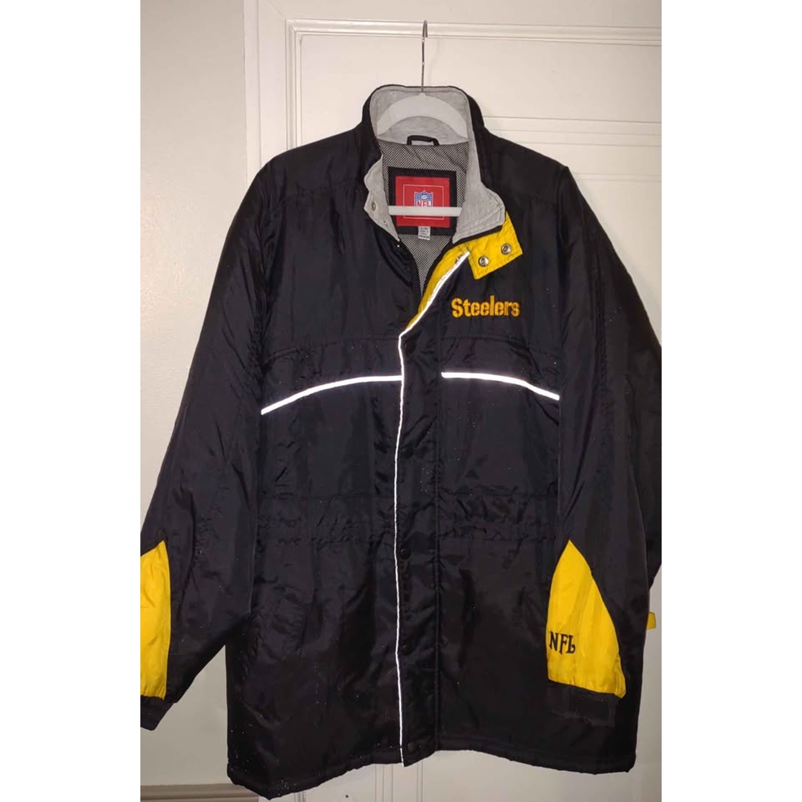 Vintage Pittsburgh Steelers NFL jacket in black and gold, size L. Made in Korea.