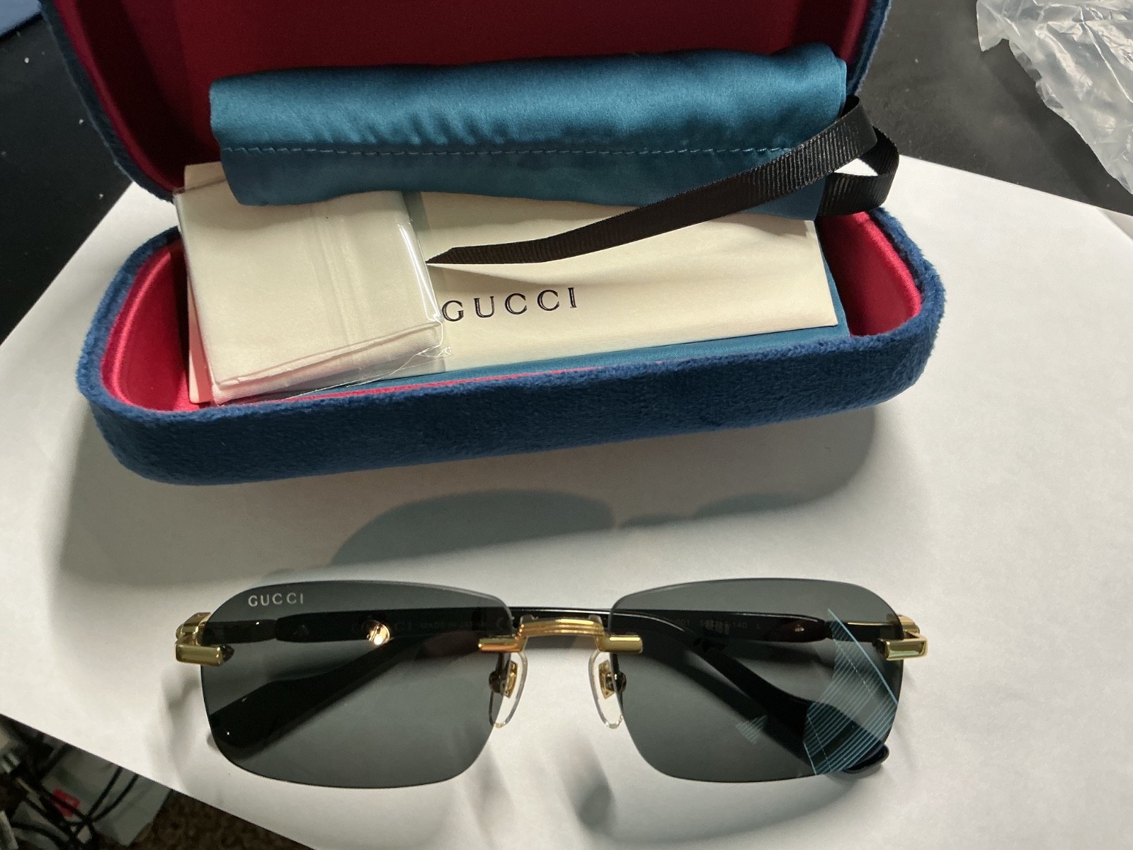 Gucci GG1221S 001 Gold-Black/Grey Rectangular Narrow Rimless Sunglasses 56/16