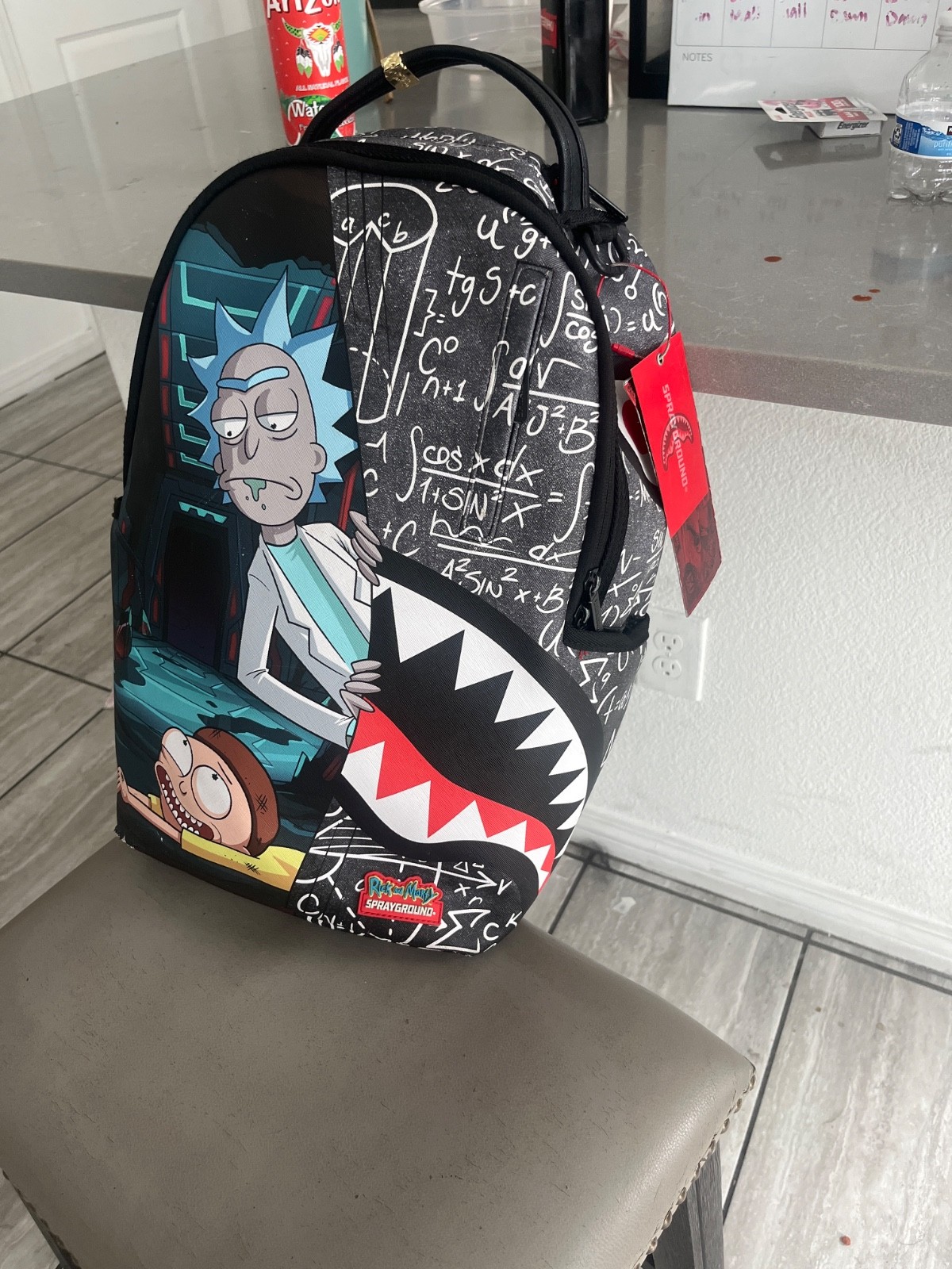 sprayground backpack ricky morty
