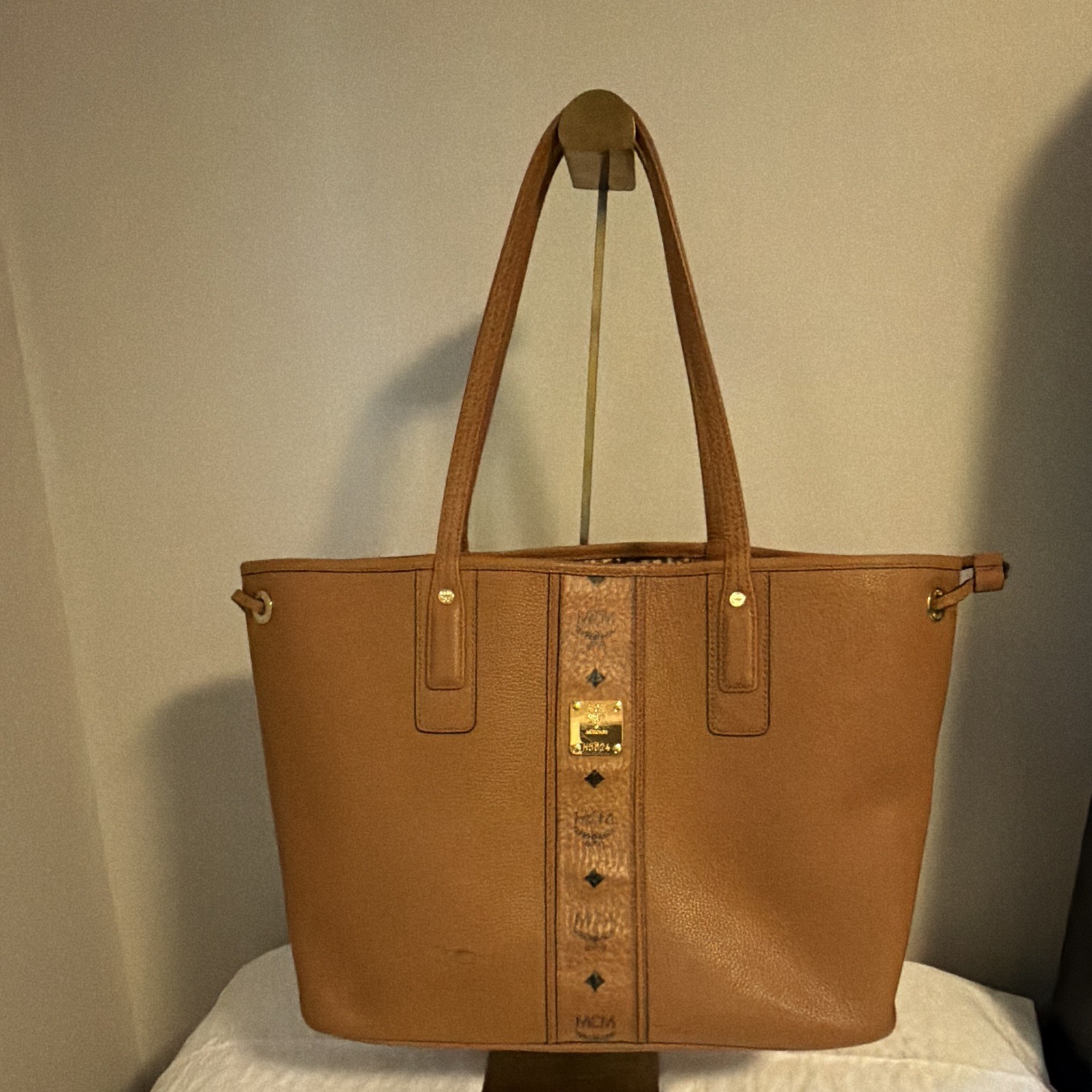 MCM Milla brown pebbled leather tote bag open, removable pouch, gold hardware