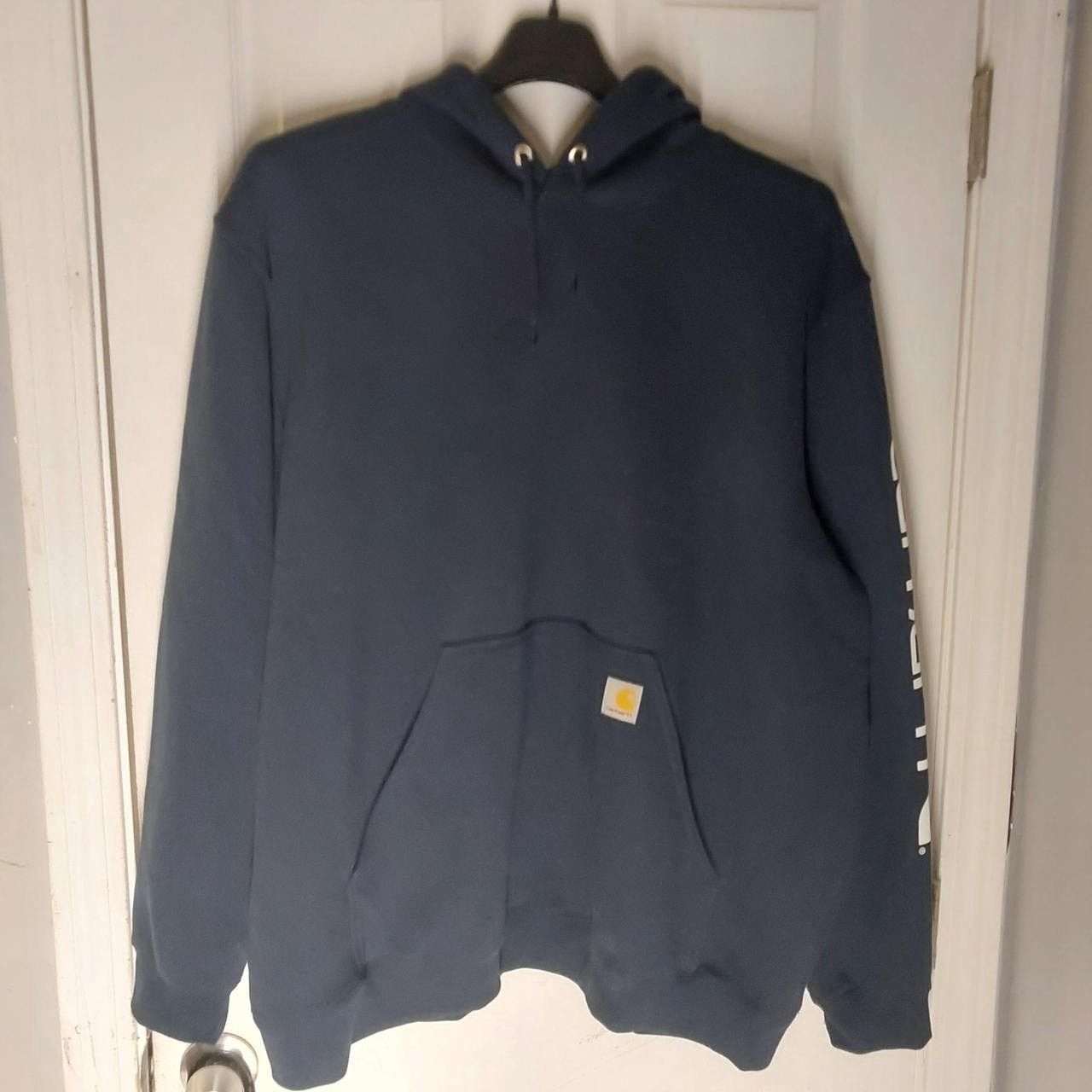 Carhartt navy blue hoodie with white logo on sleeve #workwear #outdoor