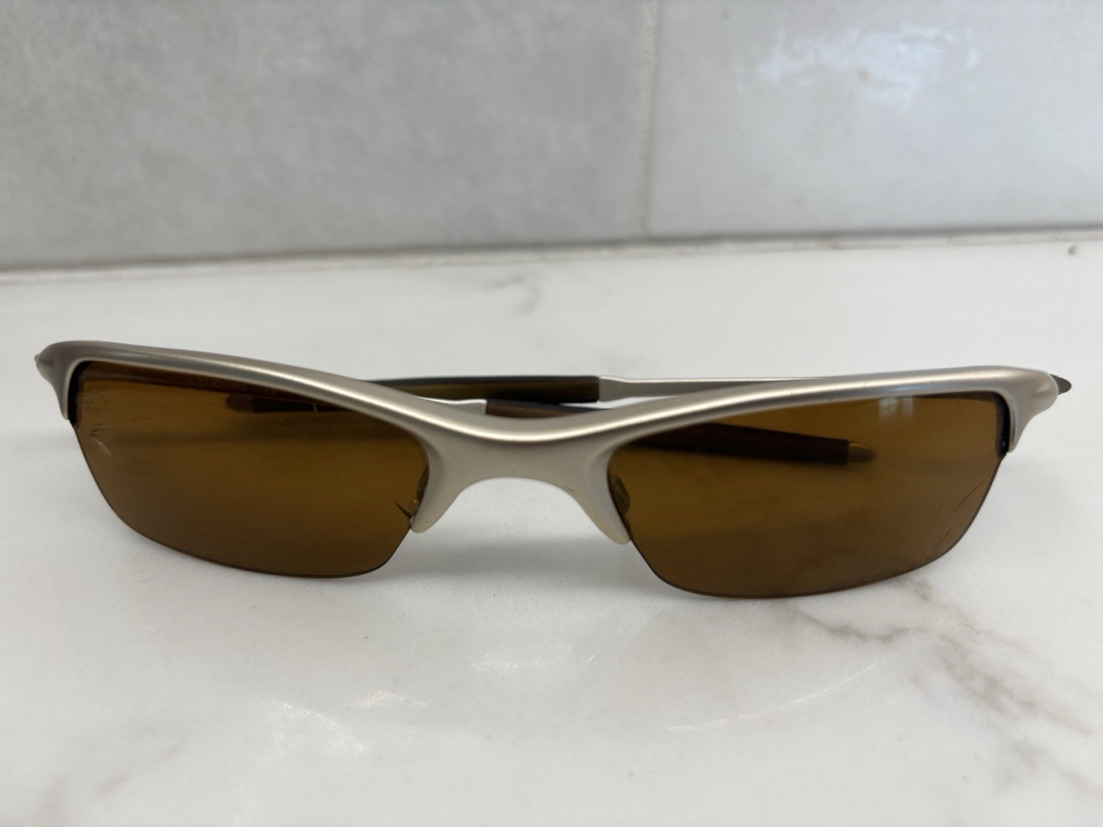 Oakley Razrwire Platinum O-Luminum UNOBTAINIUM Rootbeer Rubber Scratched Lenses