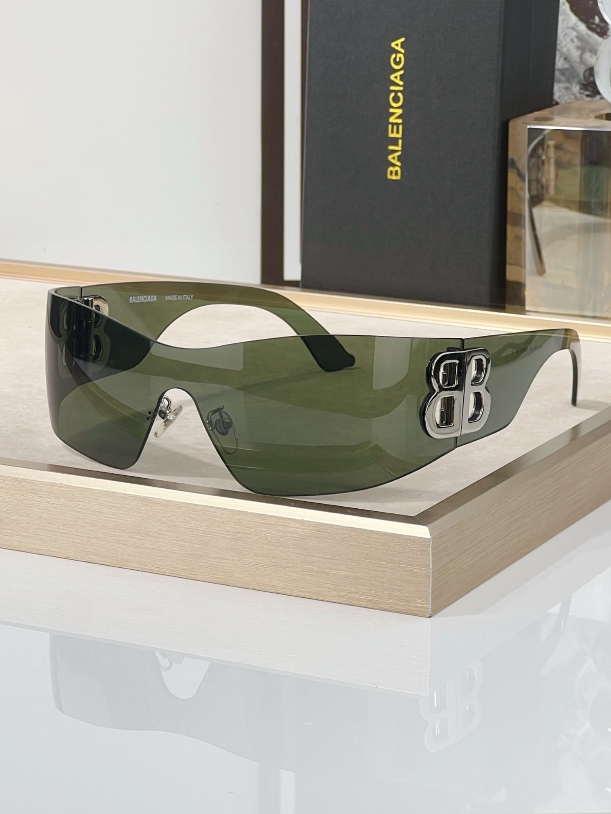Balenciaga BB0359S Eyewear One‑Piece Shield Style Dark Green Tint 99‑01‑115
