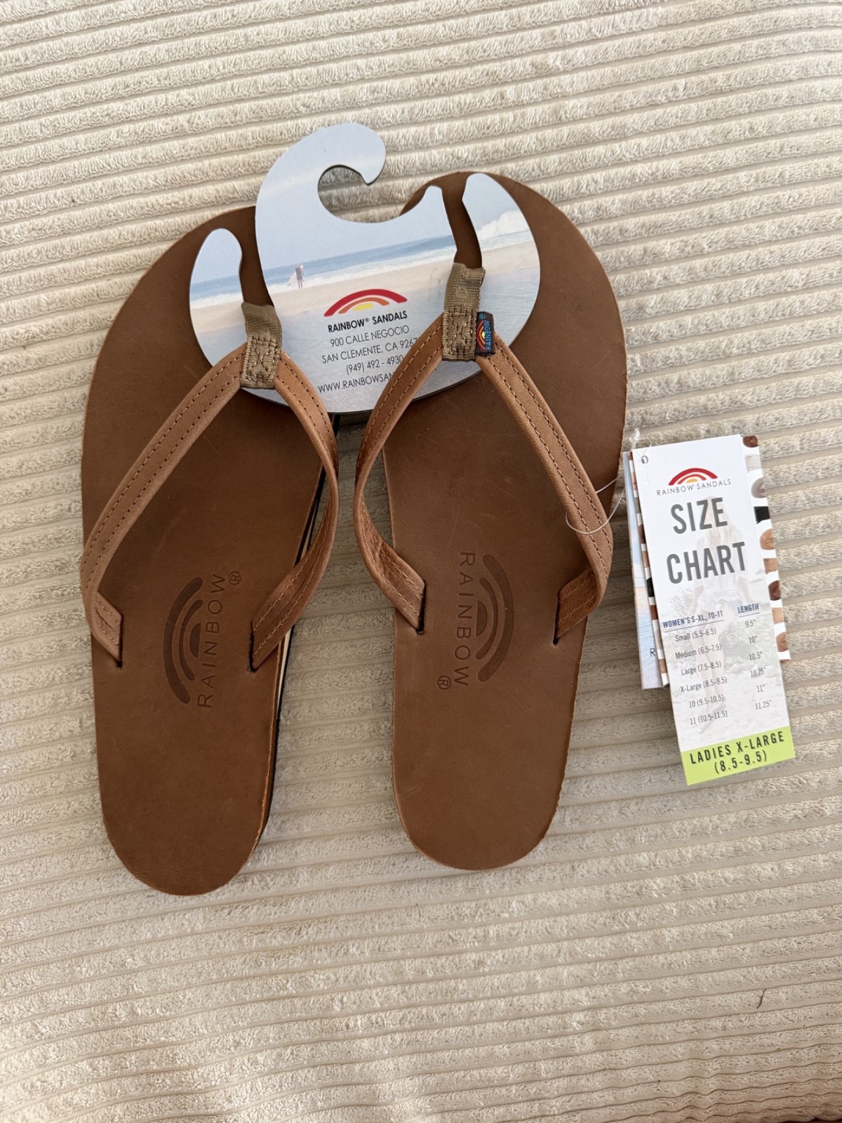 NEW UNUSED Rainbow flip flops Women\'s size Large (7-9)