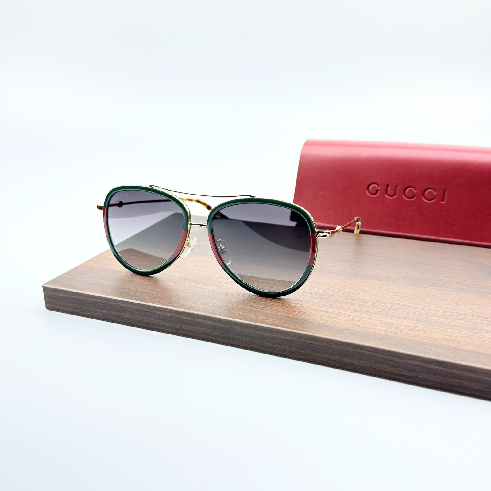 Gucci GG0062S  57mm Aviator Green/Red Unisex Sunglasses with Light Grey Lens