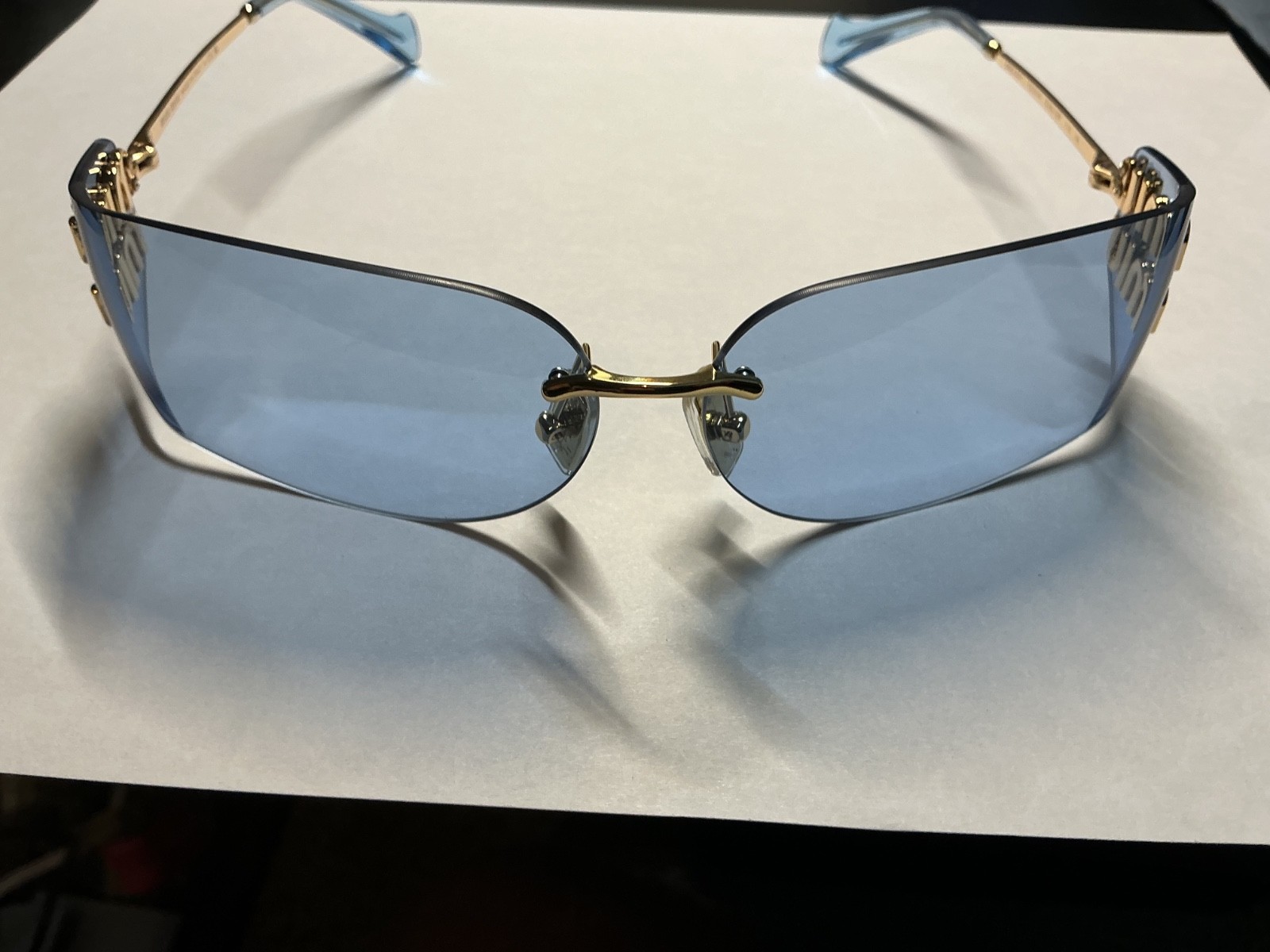 Miu Miu MU A51S ZVN10P Gold Light Blue Lens Women Wrap Sunglasses AUTHENTIC