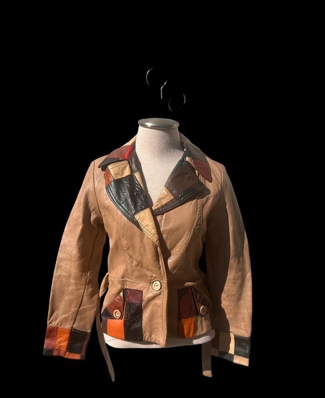 Vintage 1970s patch work belted leather jacket