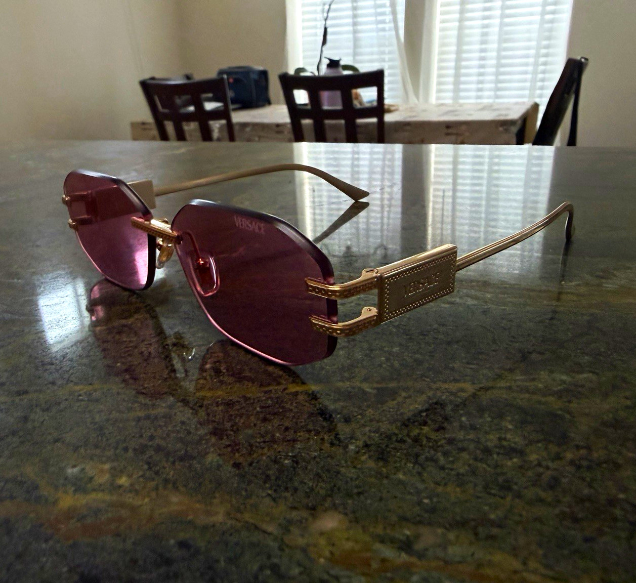 Versace VE2274 100284 Women’s Oval Rimless Gold Frame Pink Tinted UV400