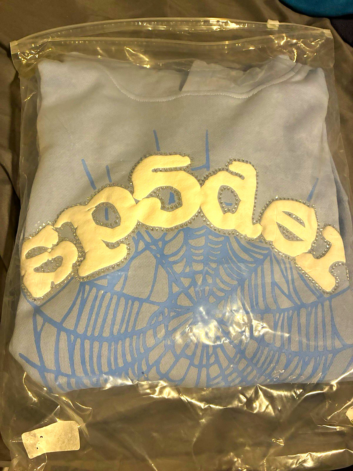     Brand new Sp5der Blue Web Rhinestone Hoodie Size Medium