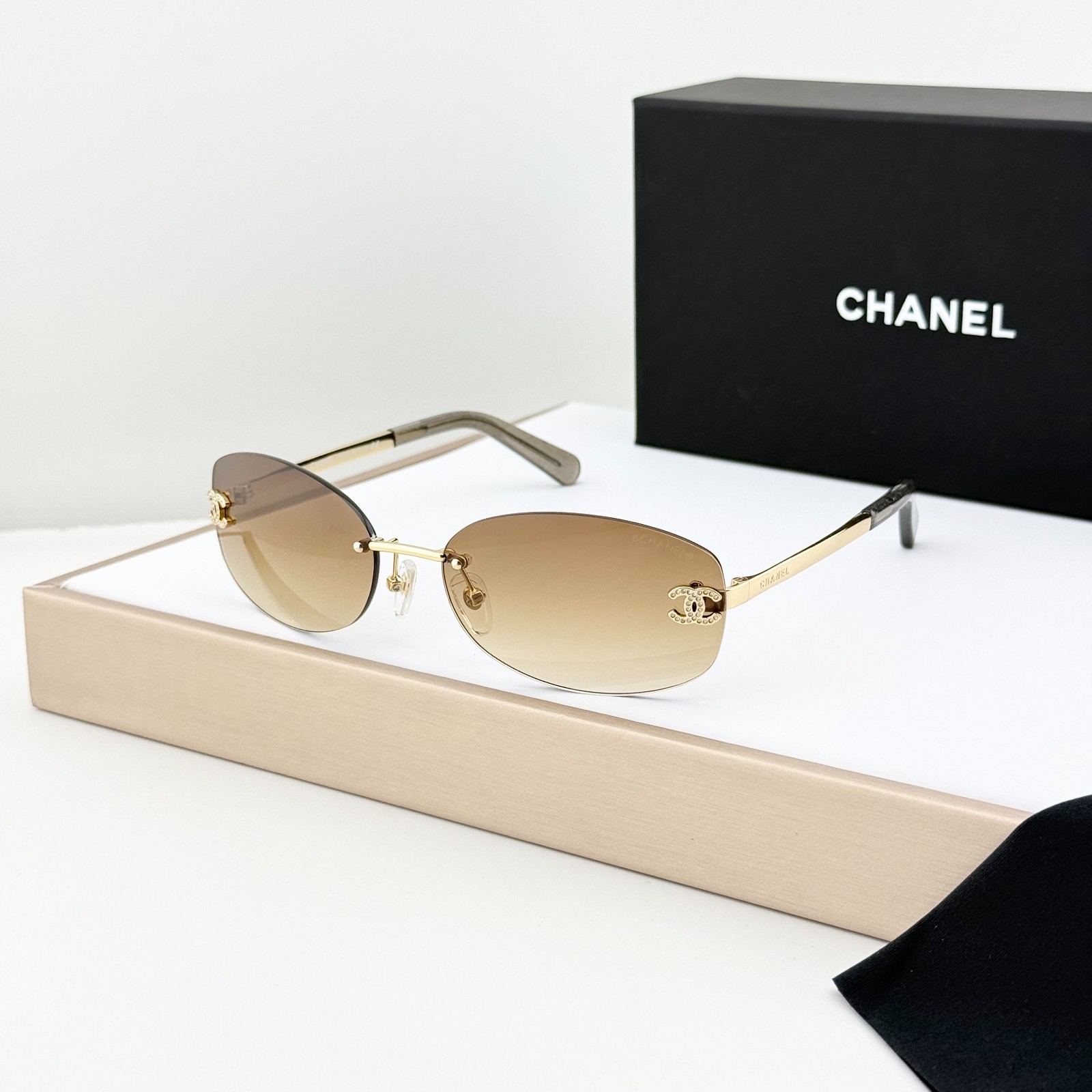 CHANEL CHA71559 Rimless Sunglasses Gold Frame Brown Gradient Lens 57-17-142