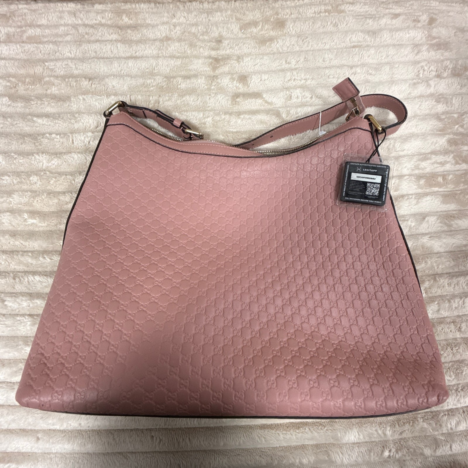 Authentic Pre-owned Gucci Pink Micro GG Embossed Leather Hobo Shoulder Bag