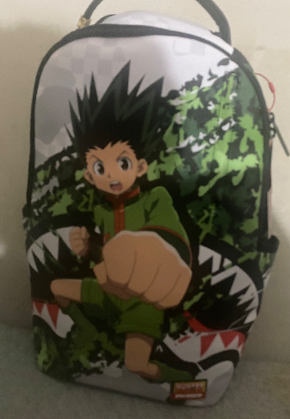 SPRAYGROUND HUNTER X HUNTER DLXR BACKPACK comes with tags and slightly used