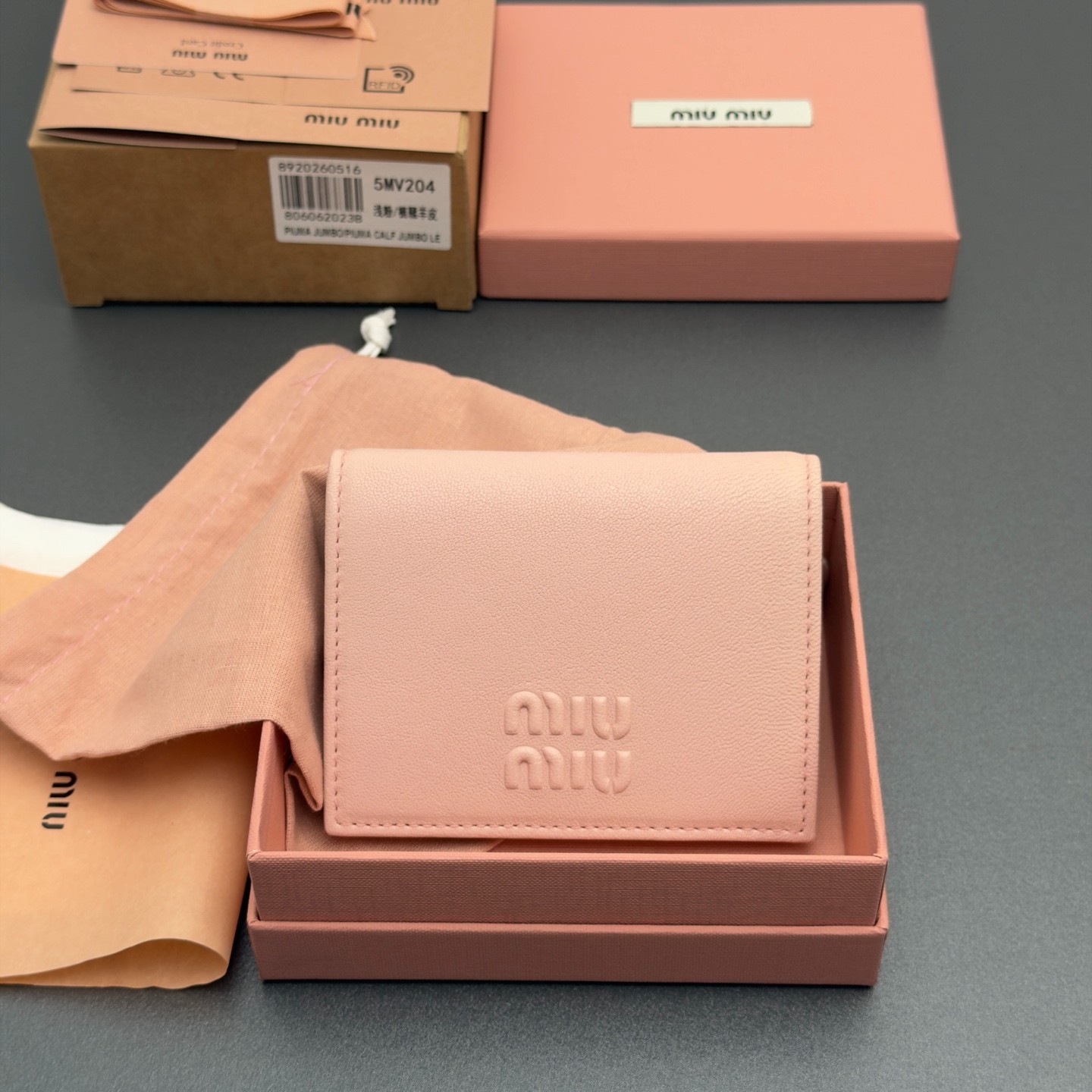Miu Miu 5MV204 Light Pink Leather Small Wallet Embossed Logo Snap Closure Women
