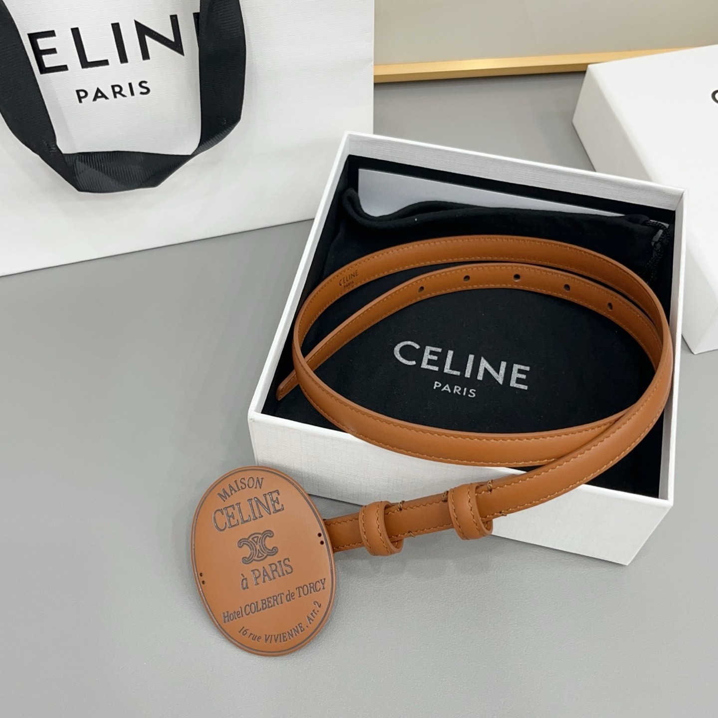 CELINE Women\'s Tan Brown Thin Belt Maison Paris Oval Statement Buckle.