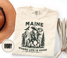 Bigfoot Riding Moose Maine Funny Comfort Tee picture