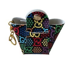 Conversion AirPod case/ Keychain From Upcycled Gucci Bag picture