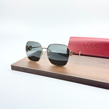 Gucci GG1207SA Sunglasses Gold Metal Frame Gray Lens GG Logo Designer Eyewear picture