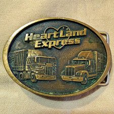 Vintage Jostens Heartland Express Oval Metal Belt Buckle GoldTone Truck Design picture