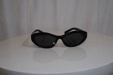 Prada Symbole Women’s Oval Sunglasses Black picture