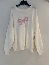 🎀 Hollister Women’s Cream Sweater with Pink Bow – Size XL  never worn picture