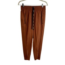 Nike Dri Fit Rip Stop Jogger Womens Size Medium Terracotta Dark Orange  picture