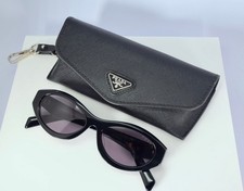 Prada PR 26ZS 16K08Z Women's Oval Sunglasses in Black with Gray Lens picture
