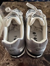 Size 10.5 -Nike P-6000 White Metallic Silver picture