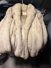 fox fur coat vintage, topaz furs , never been worn been kept in plastic bag picture