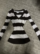 Hollister long-sleeve ribbed knit top featuring a cute light pink and brown. picture
